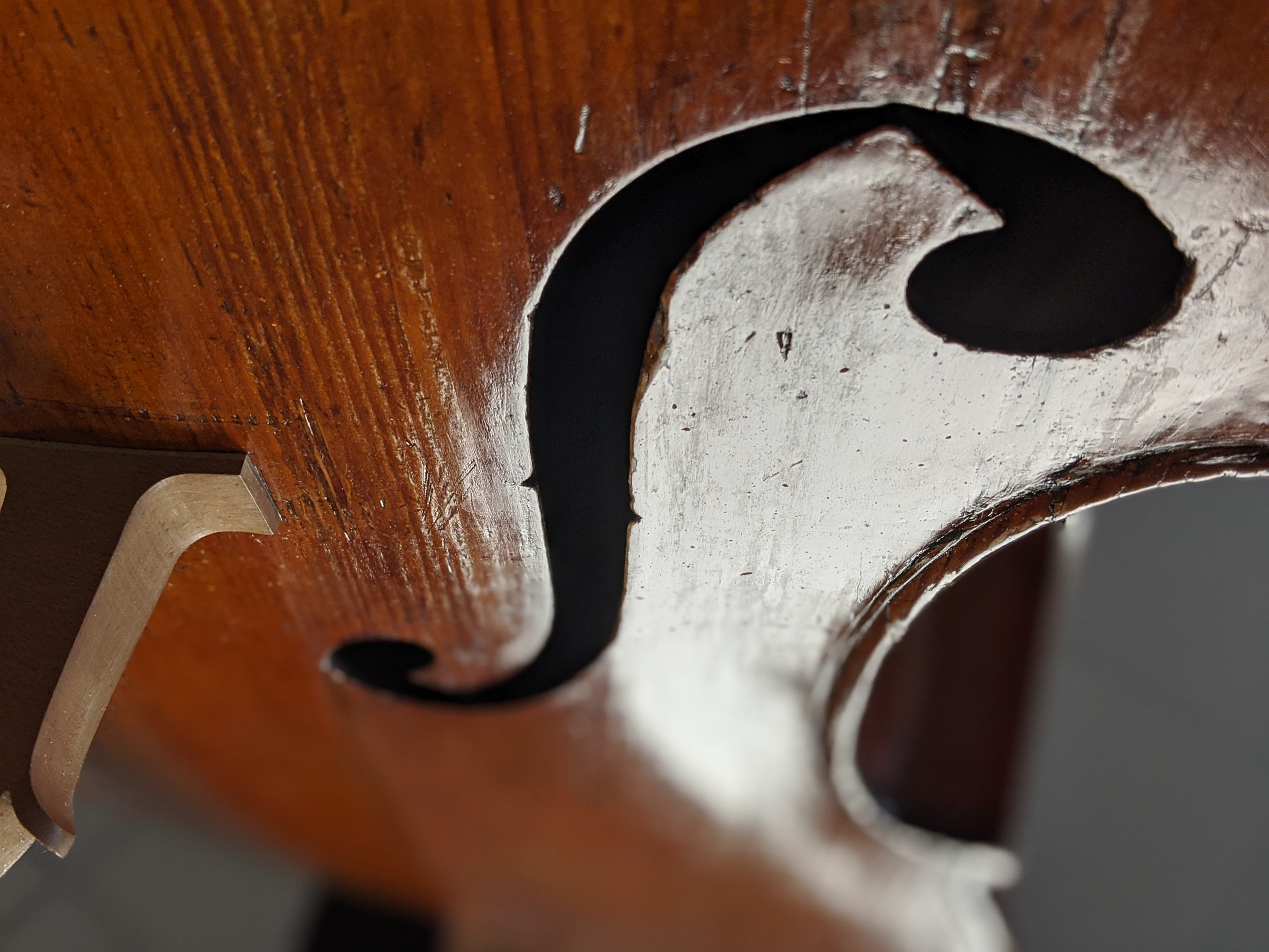Decorative picture of an old double bass representing our approach to audio development: craft, authenticity, warmth and longevity.